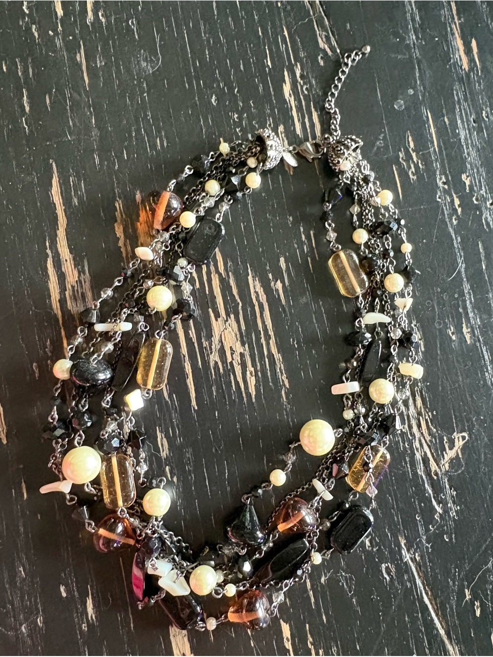 Lia Sophia Black and Cream Multi-Strand Beaded Necklace with Amber Accents